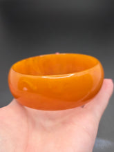Load image into Gallery viewer, 1940s Marbled Orange Bakelite Bangle
