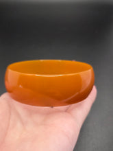 Load image into Gallery viewer, 1940s Huge Thin Orange Bakelite Bangle A
