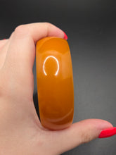 Load image into Gallery viewer, 1940s Huge Thin Orange Bakelite Bangle A
