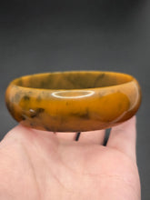 Load image into Gallery viewer, 1940s Mustard and Dark Green Marbled Egg Shape Bakelite Bangle
