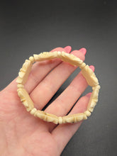 Load image into Gallery viewer, 1940s Carved Cream Tourist Edelweiss Bracelet
