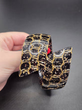 Load image into Gallery viewer, 1950s Black and Gold Confetti Lucite Clamper Bangle
