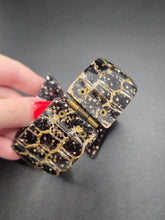Load image into Gallery viewer, 1950s Black and Gold Confetti Lucite Clamper Bangle

