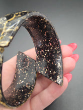 Load image into Gallery viewer, 1950s Black and Gold Confetti Lucite Clamper Bangle

