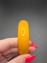 Load image into Gallery viewer, 1940s Semi Sheer Yellow Bakelite Bangle
