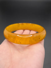 Load image into Gallery viewer, 1940s Sheer Yellow Marbled Bakelite Bangle

