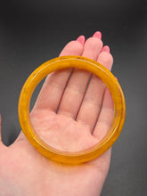 Load image into Gallery viewer, 1940s Sheer Yellow Marbled Bakelite Bangle
