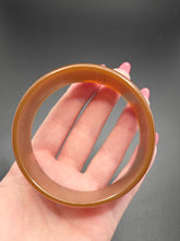 Load image into Gallery viewer, 1940s Caramel/Olive Brown/Green Bakelite Bangle
