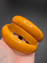 Load image into Gallery viewer, 1940s Egg Yolk Bakelite Bangle Set
