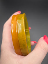 Load image into Gallery viewer, 1940s Curved Marbled Green and Orange Bakelite Bangle Set
