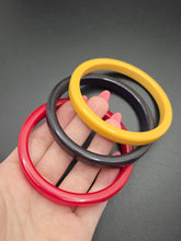 Load image into Gallery viewer, 1940s Red, Yellow and Black Bakelite Bangle Set
