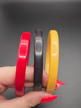 Load image into Gallery viewer, 1940s Red, Yellow and Black Bakelite Bangle Set
