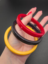 Load image into Gallery viewer, 1940s Red, Yellow and Black Bakelite Bangle Set
