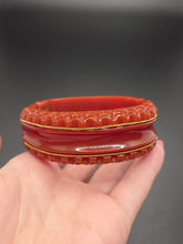Load image into Gallery viewer, 1940s Dark Caramel Carved Bakelite Clamper
