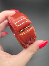 Load image into Gallery viewer, 1940s Dark Caramel Carved Bakelite Clamper
