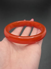 Load image into Gallery viewer, 1940s Brick Red Almost Sheer Bakelite Bangle
