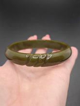 Load image into Gallery viewer, 1940s Moss Green Carved Bakelite Bangle
