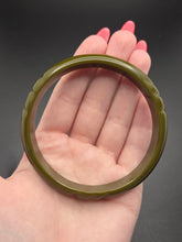 Load image into Gallery viewer, 1940s Moss Green Carved Bakelite Bangle
