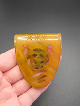 Load image into Gallery viewer, 1940s Cloudy Apple Juice Carved Bakelite Dress Clip
