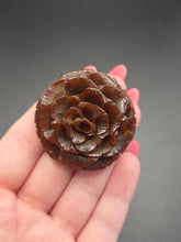 Load image into Gallery viewer, 1940s Chocolate Brown Carved Bakelite Flower Dress Clip
