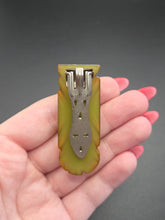 Load image into Gallery viewer, 1940s Olive Green Carved Bakelite Dress Clip
