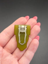 Load image into Gallery viewer, 1940s Olive Green Carved Bakelite Dress Clip
