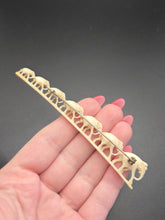 Load image into Gallery viewer, 1940s Carved Long Row Of Elephants Brooch
