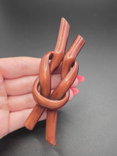 Load image into Gallery viewer, 1940s Huge Brown Celluloid Knot Spaghetti Brooch
