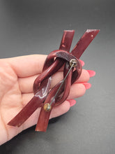 Load image into Gallery viewer, 1940s Huge Brown Celluloid Knot Spaghetti Brooch
