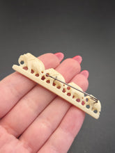 Load image into Gallery viewer, 1940s Carved Row of Elephants Brooch
