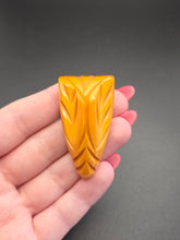 Load image into Gallery viewer, 1940s Corn Coloured Carved Bakelite Dress Clip
