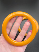 Load image into Gallery viewer, 1940s Bright Egg Yolk/Orange Saucer Matching Bakelite Bangle Set
