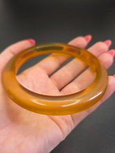 Load image into Gallery viewer, 1940s Thick Apple Juice Bakelite Bangle
