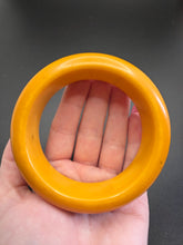 Load image into Gallery viewer, 1940s MEGA Egg Yolk Bakelite and Metal Bangle

