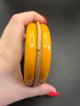 Load image into Gallery viewer, 1940s MEGA Egg Yolk Bakelite and Metal Bangle
