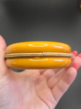 Load image into Gallery viewer, 1940s MEGA Egg Yolk Bakelite and Metal Bangle
