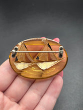 Load image into Gallery viewer, 1940s Carved Apple Juice Bakelite Boat Brooch
