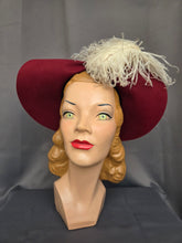 Load image into Gallery viewer, 1940s Dark Raspberry Red Felt Halo Hat With Huge Ostrich Feather
