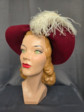 Load image into Gallery viewer, 1940s Dark Raspberry Red Felt Halo Hat With Huge Ostrich Feather
