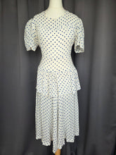 Load image into Gallery viewer, 1940s Blue and White Polka Dot Peplum Dress
