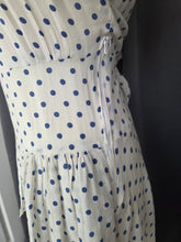 Load image into Gallery viewer, 1940s Blue and White Polka Dot Peplum Dress
