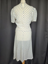 Load image into Gallery viewer, 1940s Blue and White Polka Dot Peplum Dress
