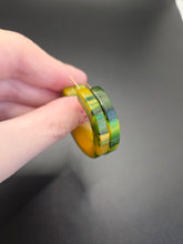 Load image into Gallery viewer, 1940s Green and Yellow Marbled Bakelite Hoop Earrings

