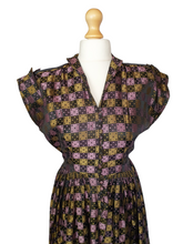 Load image into Gallery viewer, 1950s Novelty Domino Print Green and Purple Dress
