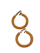 Load image into Gallery viewer, 1940s Apricot Orange Bakelite Hoop Earrings

