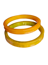 Load image into Gallery viewer, 1940s Curved Marbled Green and Orange Bakelite Bangle Set
