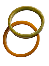 Load image into Gallery viewer, 1940s Curved Marbled Green and Orange Bakelite Bangle Set
