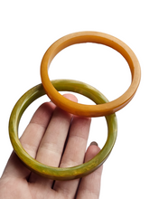 Load image into Gallery viewer, 1940s Curved Marbled Green and Orange Bakelite Bangle Set
