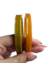 Load image into Gallery viewer, 1940s Curved Marbled Green and Orange Bakelite Bangle Set
