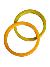 Load image into Gallery viewer, 1940s Curved Marbled Green and Orange Bakelite Bangle Set
